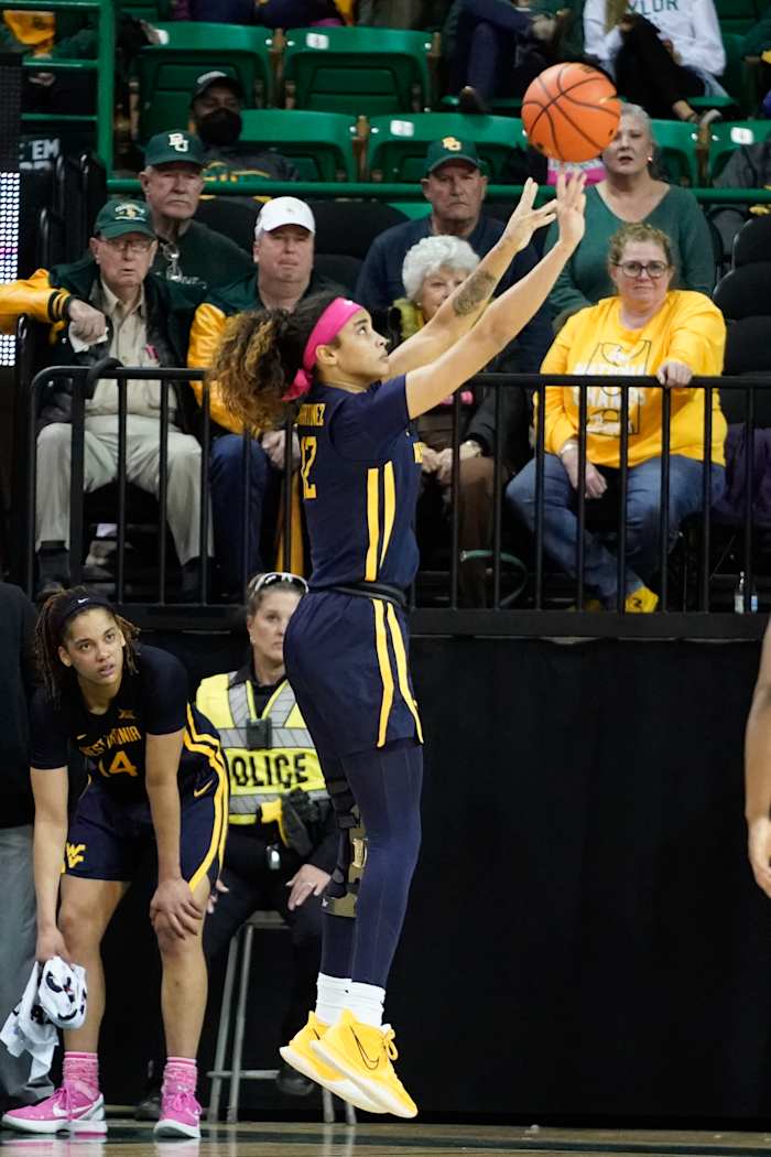 Feb 12, 2022; Waco, Texas, USA; West Virginia Mountaineers forward Esmery Martinez (12) shoots against the Baylor Lady Bears during the second half at Ferrell Center. Mandatory Credit: Chris Jones-USA TODAY Sports